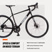 Mongoose Define rower szosowy dla dorosłych, 14-biegowy, hamulec tarczowy, 19-calowa rama aluminiowa, opony 700C, czarny Mongoose 